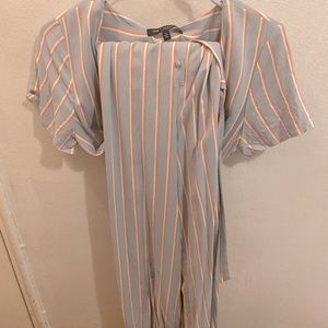 Here’s a summertime jumpsuit. It has short sleeves and buttons to get in and out